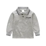 a grey polo shirt with black stripes