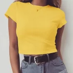 a woman wearing a yellow shirt