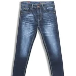 A pair of blue denim jeans laid flat on a white background.