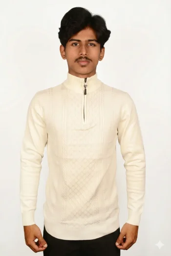 A person wearing a light cream zip-up sweater with a textured pattern, standing against a plain white background.
