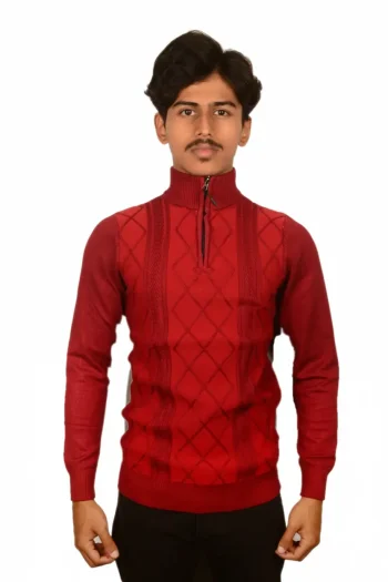 A person wearing a red zip-up sweater with a textured diamond pattern, standing against a plain white background.